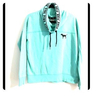 Pink teal sweatshirt.